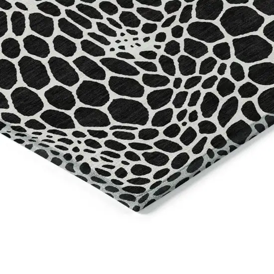Black And Ivory Geometric Washable Indoor Outdoor Area Rug Photo 5