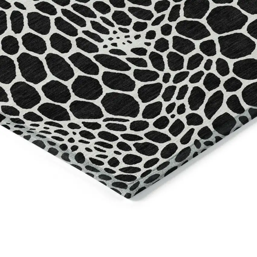 Black And Ivory Geometric Washable Indoor Outdoor Area Rug Photo 5
