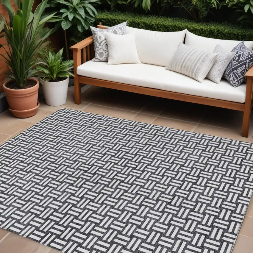 Black And Ivory Geometric Washable Indoor Outdoor Area Rug Photo 1