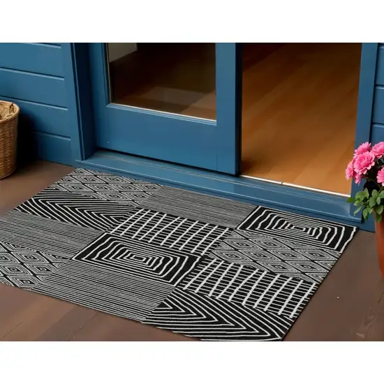 Black And Ivory Geometric Washable Indoor Outdoor Area Rug Photo 1