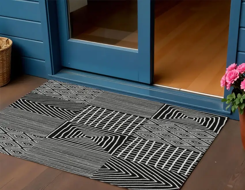 Black And Ivory Geometric Washable Indoor Outdoor Area Rug Photo 1