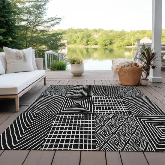 Black And Ivory Geometric Washable Indoor Outdoor Area Rug Photo 9