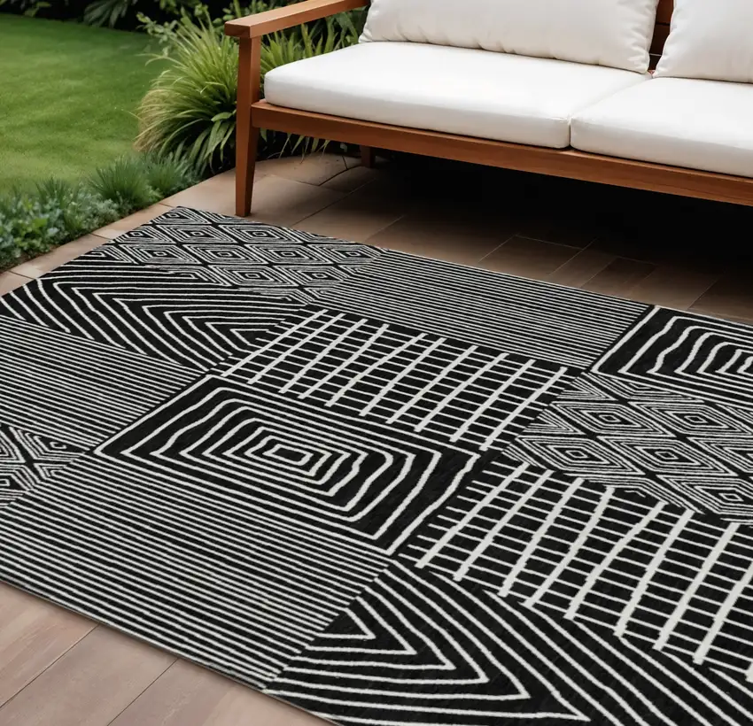 Black And Ivory Geometric Washable Indoor Outdoor Area Rug Photo 1