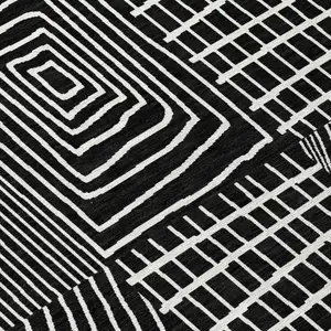 Photo of Black And Ivory Geometric Washable Indoor Outdoor Area Rug