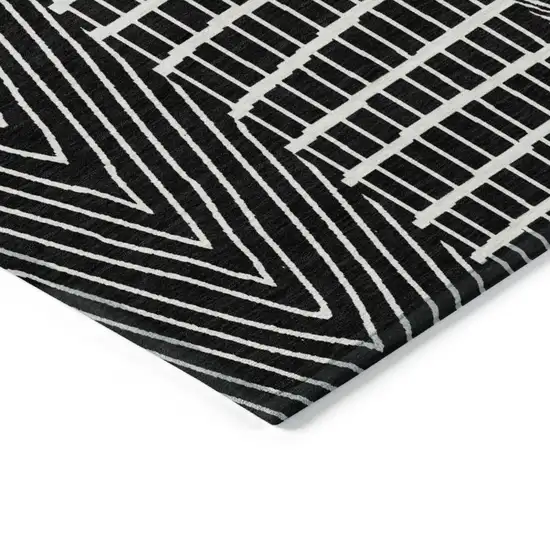 Black And Ivory Geometric Washable Indoor Outdoor Area Rug Photo 4