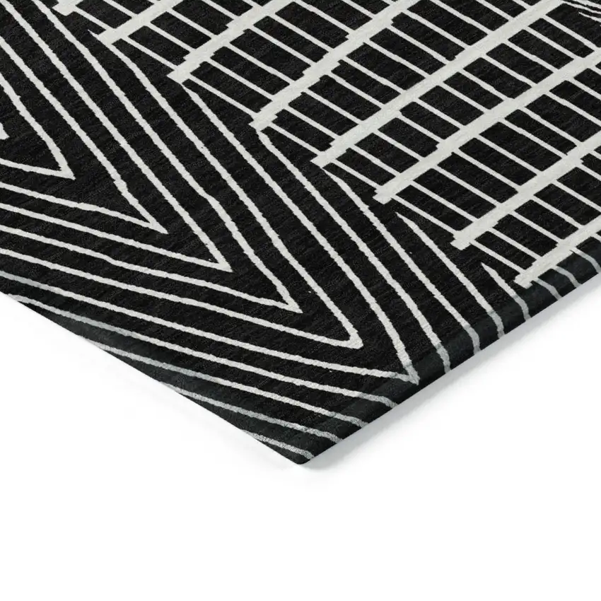 Black And Ivory Geometric Washable Indoor Outdoor Area Rug Photo 4