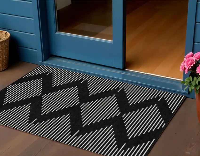 Black And Ivory Geometric Washable Indoor Outdoor Area Rug Photo 1