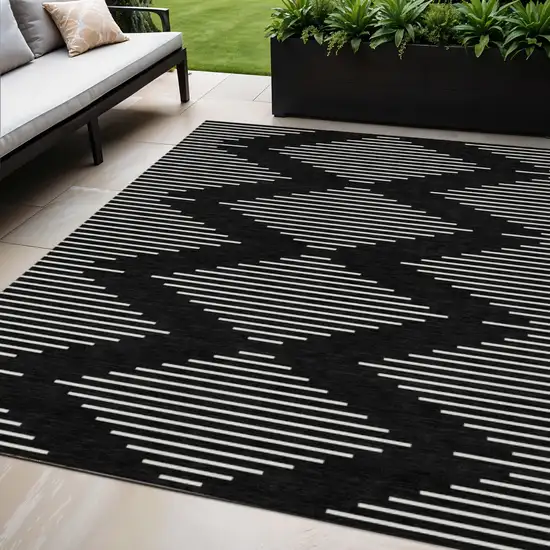 Black And Ivory Geometric Washable Indoor Outdoor Area Rug Photo 1