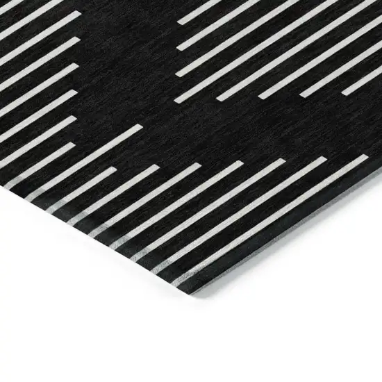Black And Ivory Geometric Washable Indoor Outdoor Area Rug Photo 4