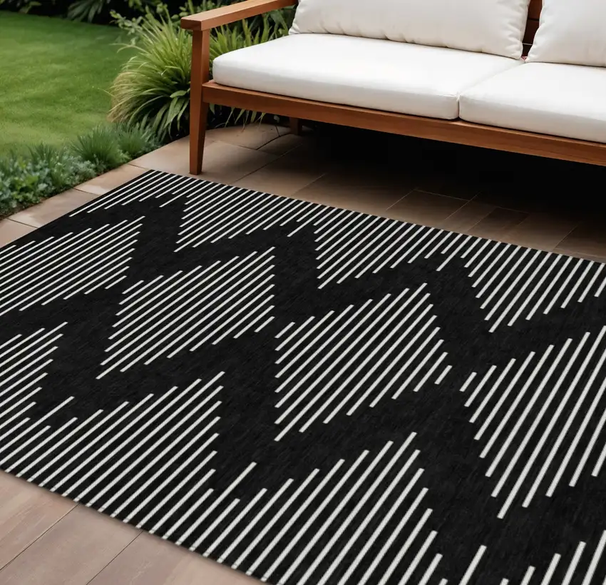 Black And Ivory Geometric Washable Indoor Outdoor Area Rug Photo 1