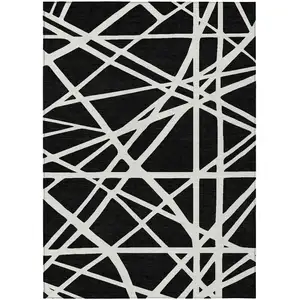 Photo of Black And Ivory Geometric Washable Indoor Outdoor Area Rug