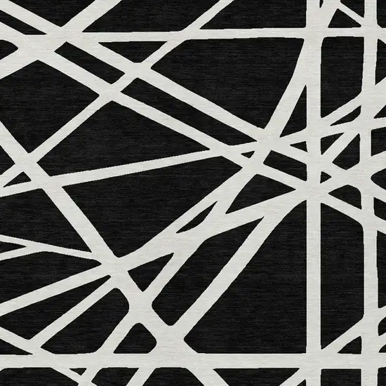 Black And Ivory Geometric Washable Indoor Outdoor Area Rug Photo 4