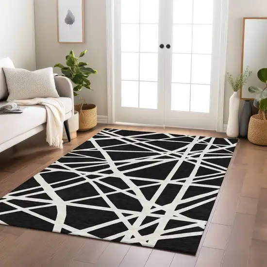 Black And Ivory Geometric Washable Indoor Outdoor Area Rug Photo 9