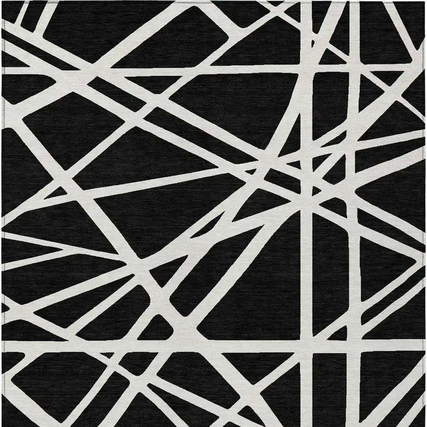 Black And Ivory Geometric Washable Indoor Outdoor Area Rug Photo 6