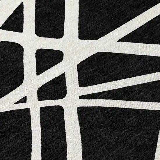Black And Ivory Geometric Washable Indoor Outdoor Area Rug Photo 5