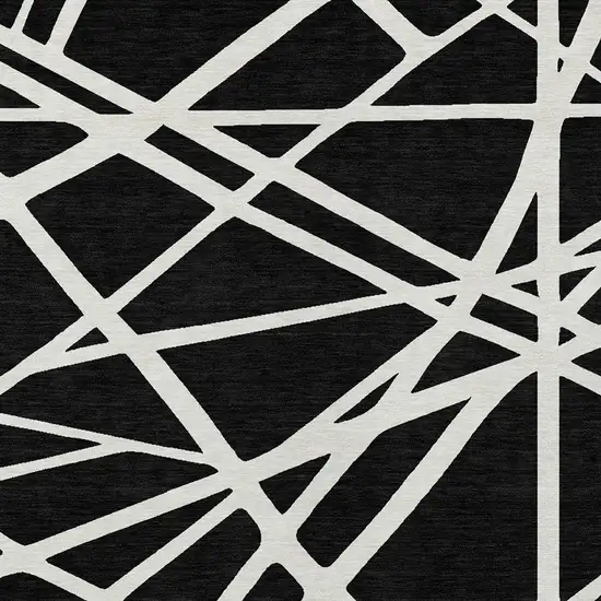 Black And Ivory Geometric Washable Indoor Outdoor Area Rug Photo 6