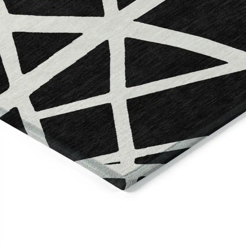Black And Ivory Geometric Washable Indoor Outdoor Area Rug Photo 4