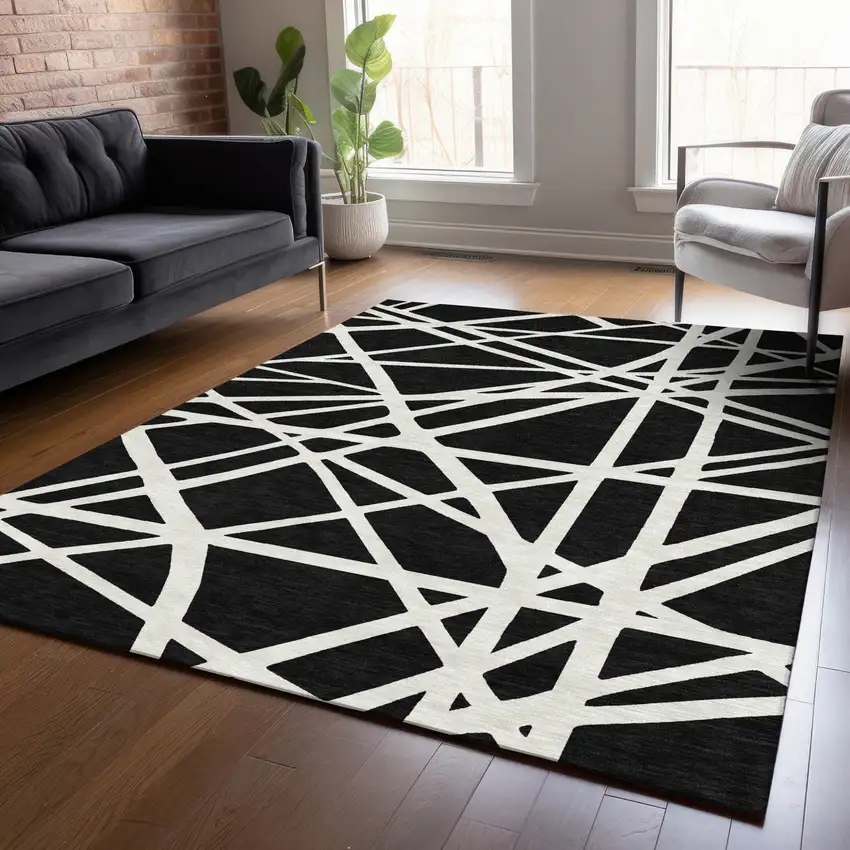 Black And Ivory Geometric Washable Indoor Outdoor Area Rug Photo 9
