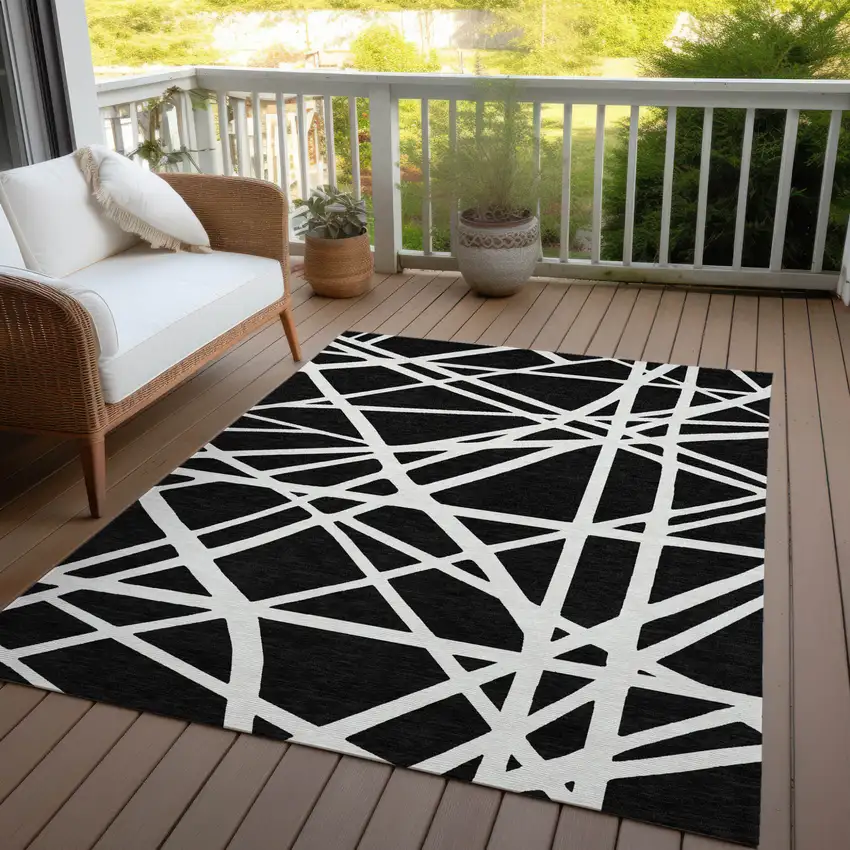 Black And Ivory Geometric Washable Indoor Outdoor Area Rug Photo 9