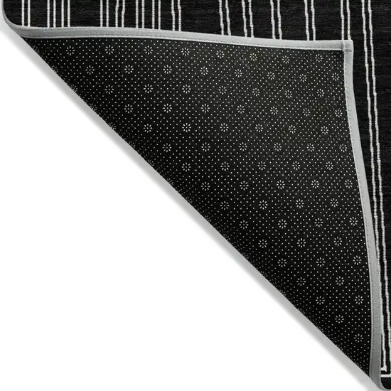 Black And Ivory Geometric Washable Indoor Outdoor Area Rug Photo 3