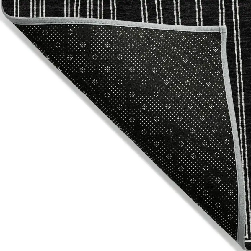 Black And Ivory Geometric Washable Indoor Outdoor Area Rug Photo 3