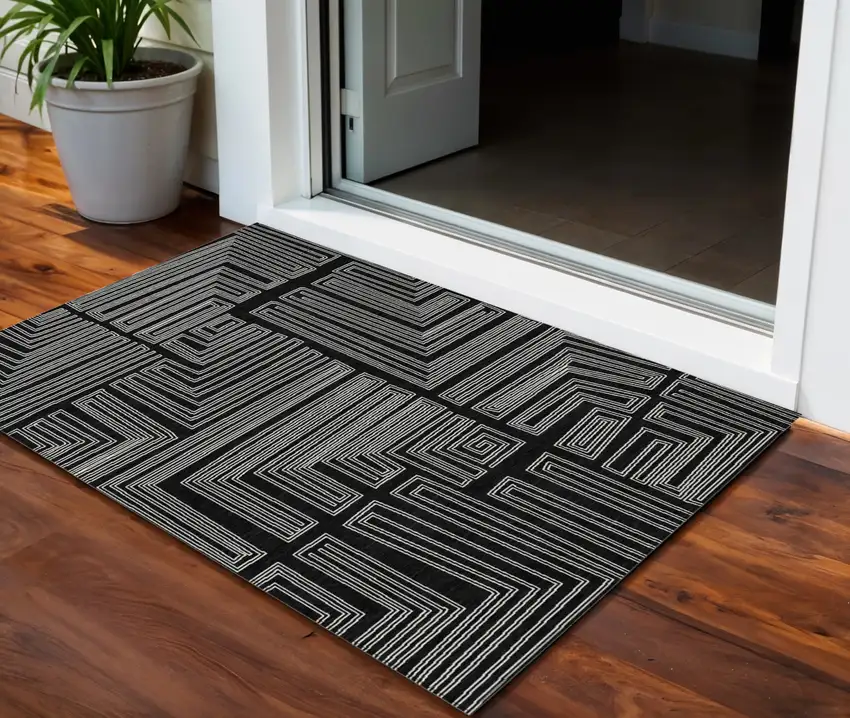 Black And Ivory Geometric Washable Indoor Outdoor Area Rug Photo 1