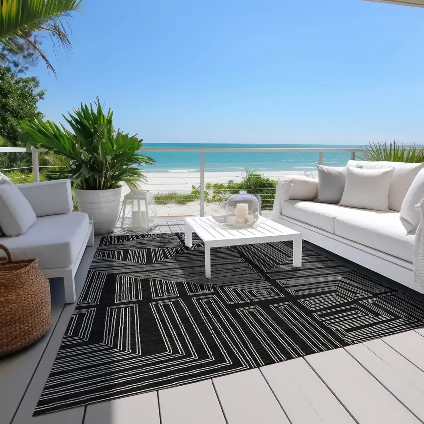 Black And Ivory Geometric Washable Indoor Outdoor Area Rug Photo 9