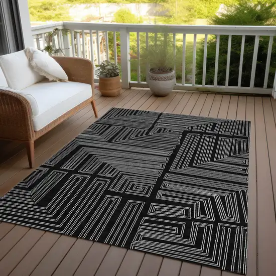 Black And Ivory Geometric Washable Indoor Outdoor Area Rug Photo 6