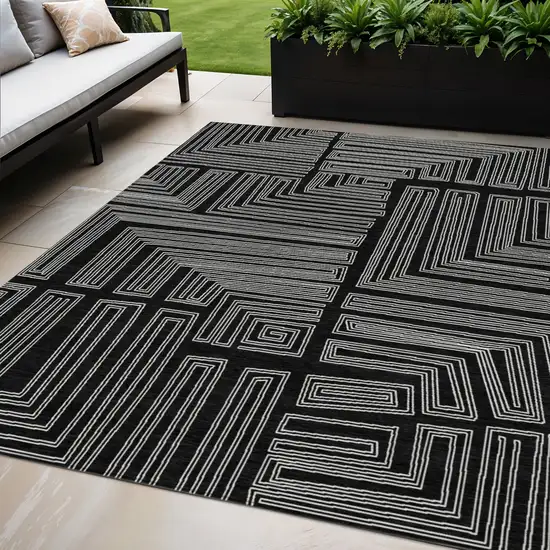 Black And Ivory Geometric Washable Indoor Outdoor Area Rug Photo 1