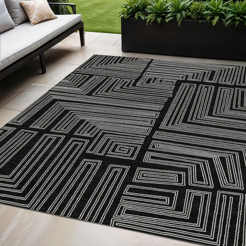 Black And Ivory Geometric Washable Indoor Outdoor Area Rug Photo 1