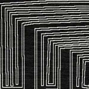 Photo of Black And Ivory Geometric Washable Indoor Outdoor Area Rug