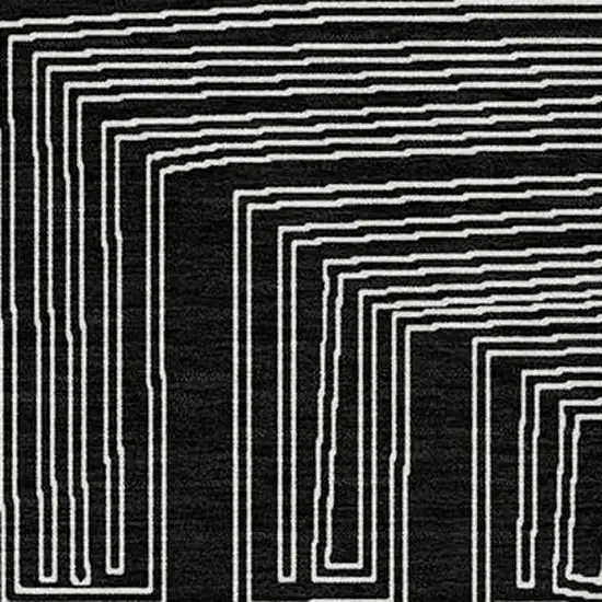 Black And Ivory Geometric Washable Indoor Outdoor Area Rug Photo 5