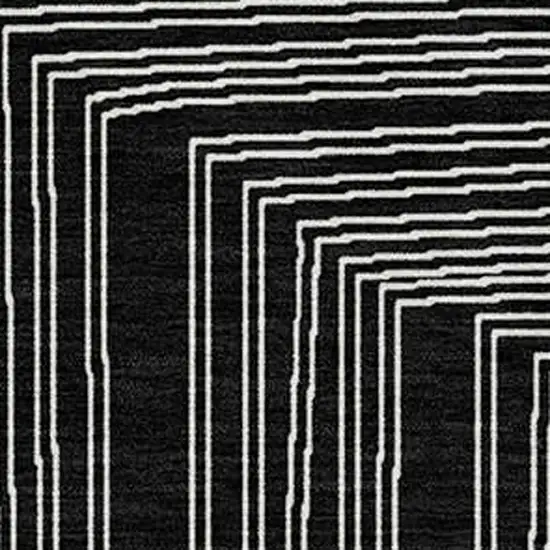 Black And Ivory Geometric Washable Indoor Outdoor Area Rug Photo 5