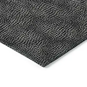 Photo of Black And Ivory Geometric Washable Indoor Outdoor Area Rug