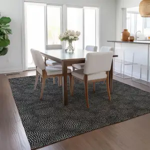 Photo of Black And Ivory Geometric Washable Indoor Outdoor Area Rug
