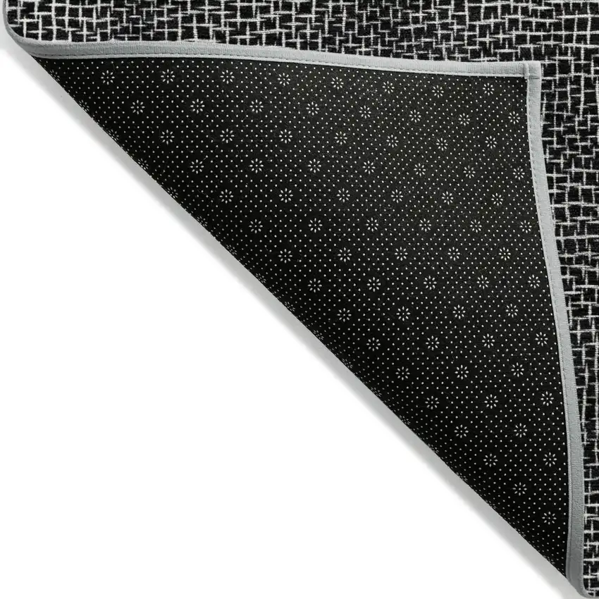 Black And Ivory Geometric Washable Indoor Outdoor Area Rug Photo 3