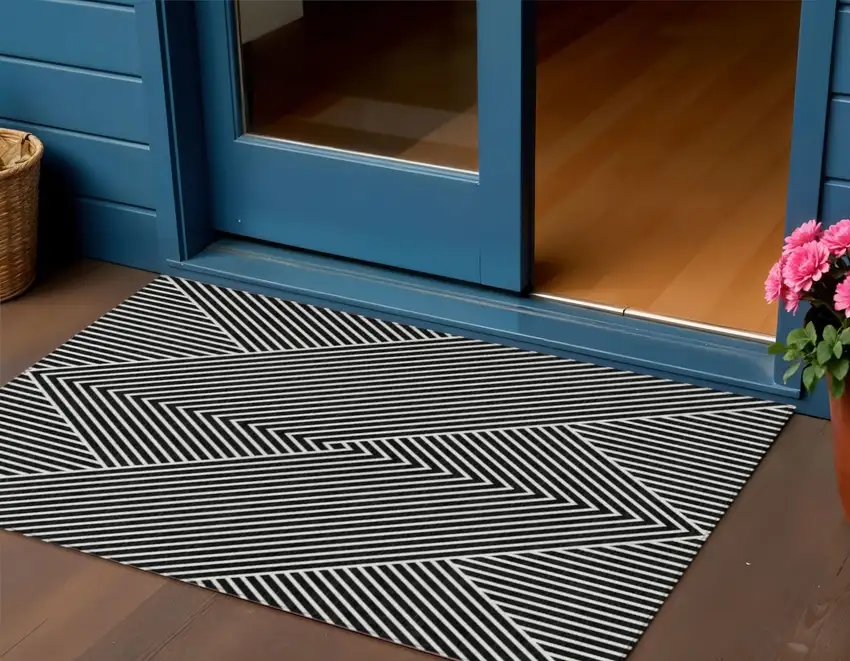 Black And Ivory Geometric Washable Indoor Outdoor Area Rug Photo 1