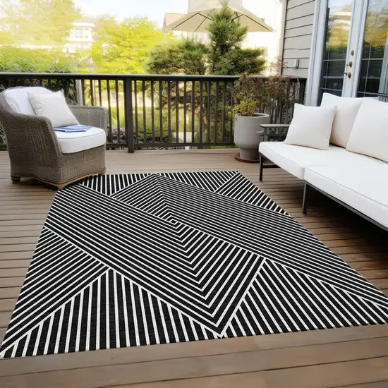 Black And Ivory Geometric Washable Indoor Outdoor Area Rug Photo 9