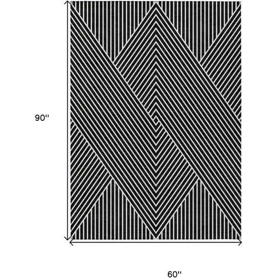 Black And Ivory Geometric Washable Indoor Outdoor Area Rug Photo 3