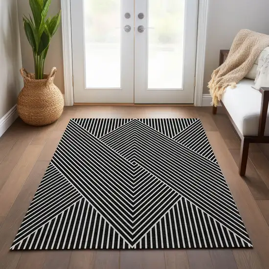 Black And Ivory Geometric Washable Indoor Outdoor Area Rug Photo 9