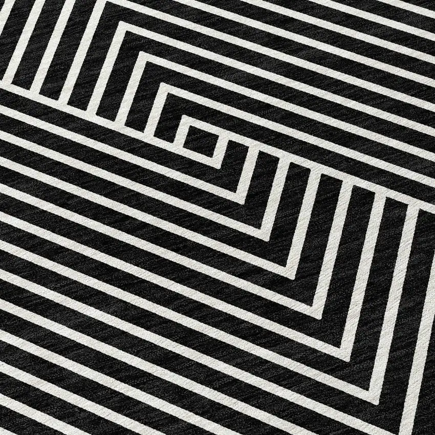 Black And Ivory Geometric Washable Indoor Outdoor Area Rug Photo 6