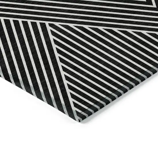 Black And Ivory Geometric Washable Indoor Outdoor Area Rug Photo 4