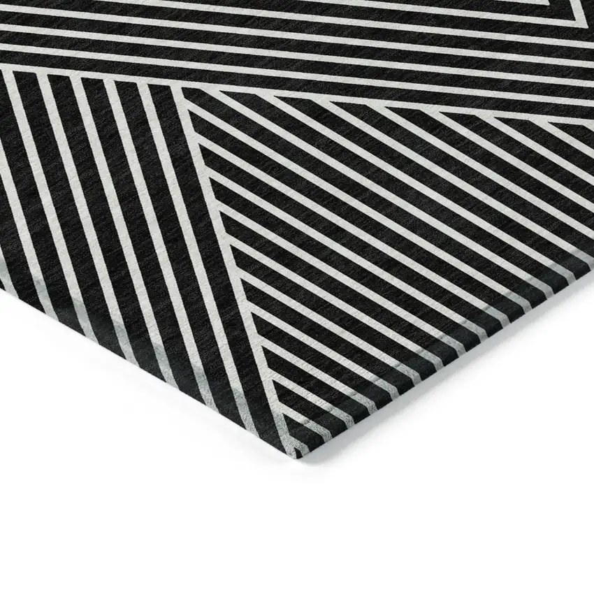 Black And Ivory Geometric Washable Indoor Outdoor Area Rug Photo 4