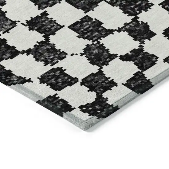 Black And Ivory Geometric Washable Indoor Outdoor Area Rug Photo 9