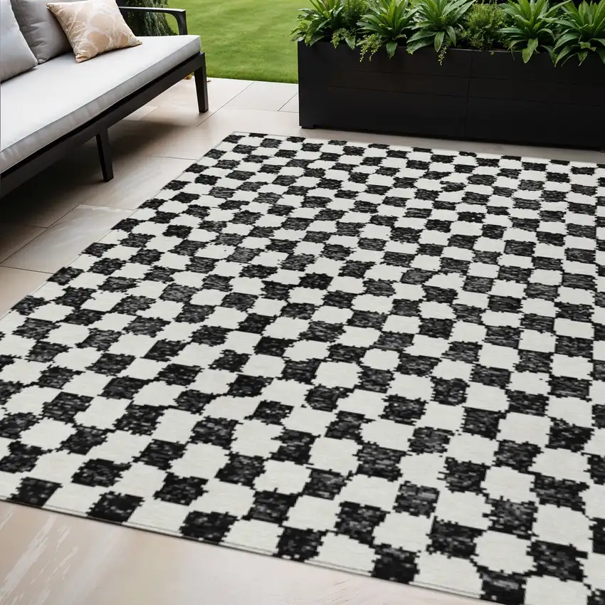 Black And Ivory Geometric Washable Indoor Outdoor Area Rug Photo 2