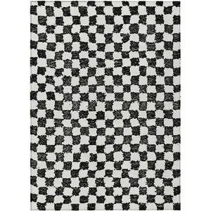 Photo of Black And Ivory Geometric Washable Indoor Outdoor Area Rug