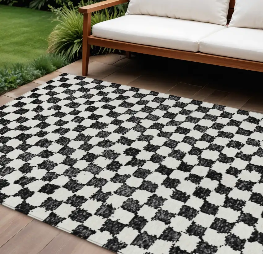 Black And Ivory Geometric Washable Indoor Outdoor Area Rug Photo 2