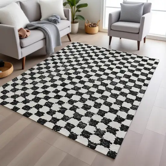 Black And Ivory Geometric Washable Indoor Outdoor Area Rug Photo 6
