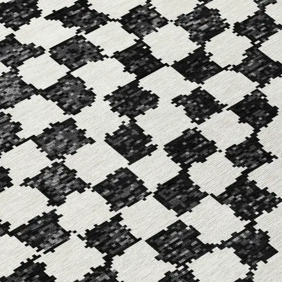 Black And Ivory Geometric Washable Indoor Outdoor Area Rug Photo 8