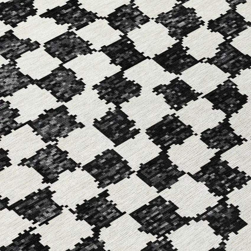 Black And Ivory Geometric Washable Indoor Outdoor Area Rug Photo 8